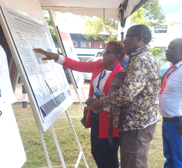 Gladys Namacha in discussion with Dr Narcis Kabatereine Gladys Namacha in discussion with Dr Narcis Kabatereine