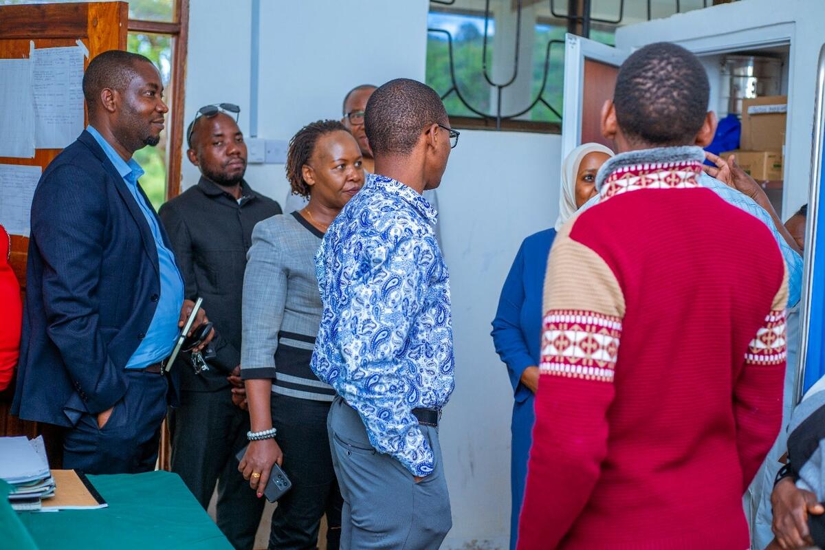 LSTM and UDOM teams receiving Kichangani Dispensary's progress on the provision of quality ANC-PNC services. Photo credit UDOM