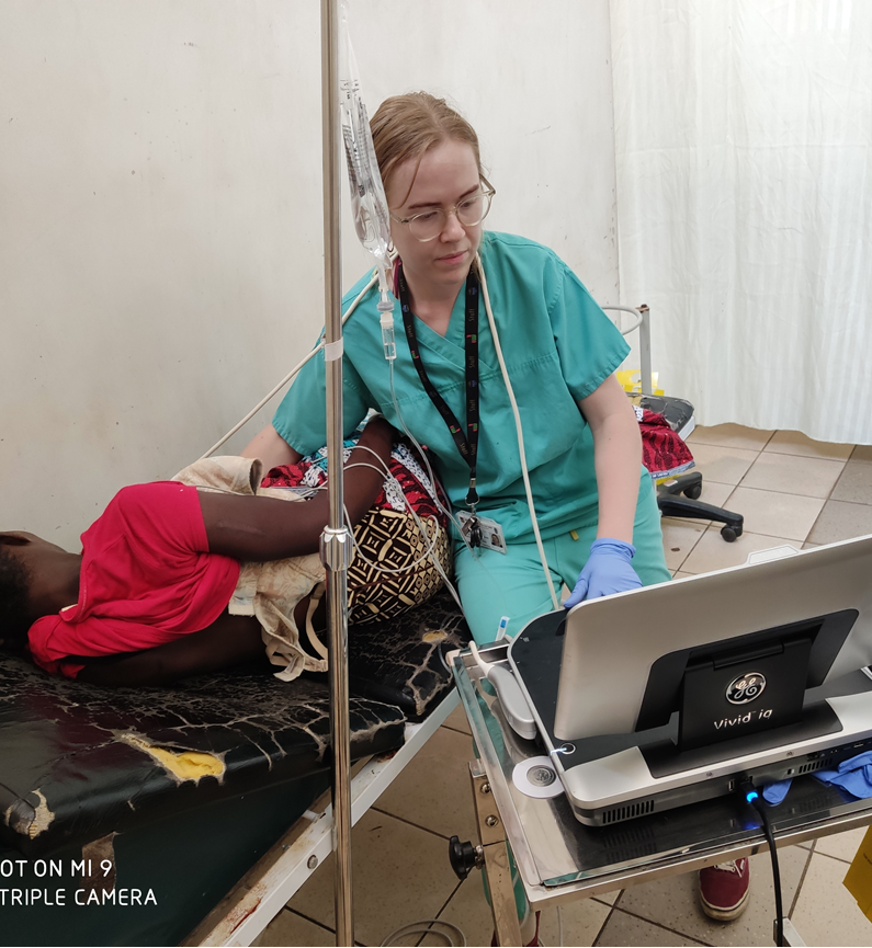 Performing an echocardiogram on a participant . Image used with permission. Performing an echocardiogram on a participant . Image used with permission.