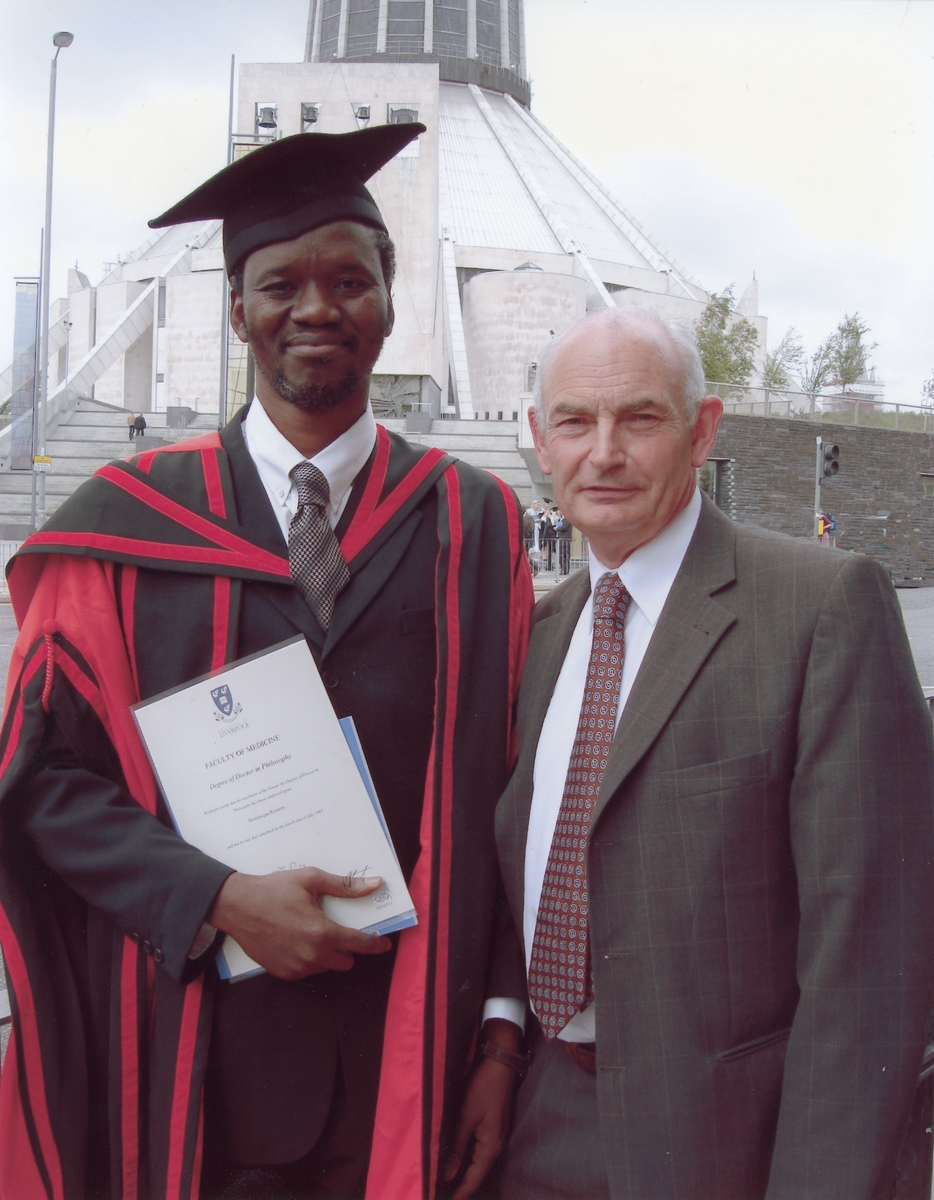Professor Molyneux with Dr Dominique Kyelem at his PhD award ceremony
