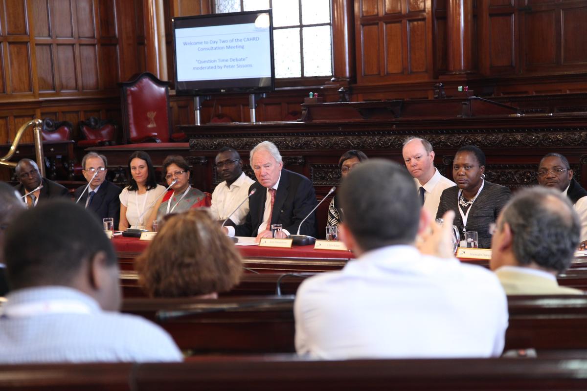 Peter Sissons moderating an LSTM hosted academic debate in 2015