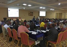Luigi D'Aquino presenting the findings of the Rwanda evaluation