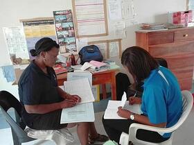 Collecting data at Onyaanya Health Centre