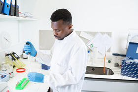 Photo of a student in the lab
