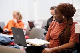 Photo of an LSTM student in a lecture