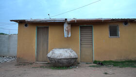 A house in one of the trial villages with screening plus EaveTubes installed. Photo: Daniel Lesher (Penn State University)