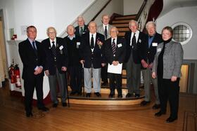 POWs standing by the stairs in the LSTM building