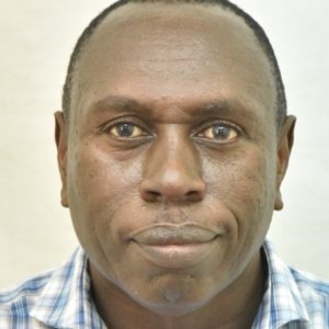 Headshot of Dr Sam Kariuki