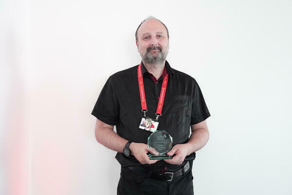 Photo of LSTM staff award winnner Jim Reed