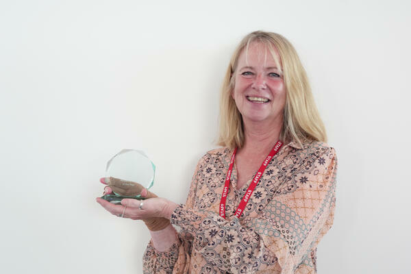 Photo of the Menstrual Health Research Group with their staff award