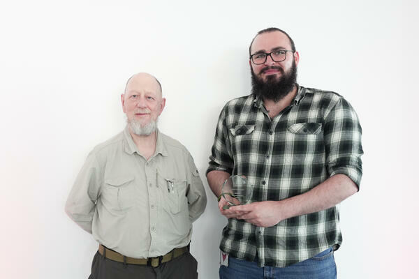 Photo of the herpetarium team with their staff award