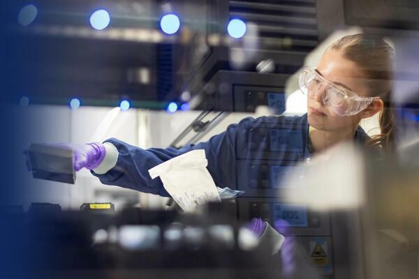 Photo of someone in a life science lab.