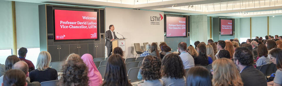 Photo of David Lalloo speaking at the 2024 Scientific Symposium