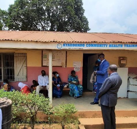 MoH officials interacting with patients in the waiting area