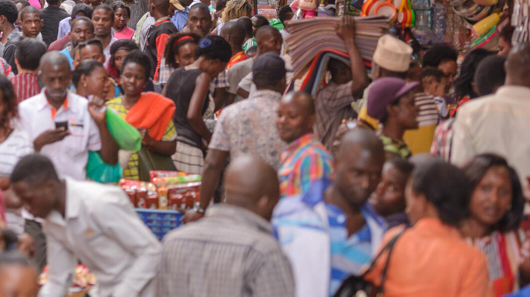 KAMPALA, UGANDA - APRIL 17TH 2018. People go about their everyday business in Kikuubo, one of Kampala's busiest trading areas.