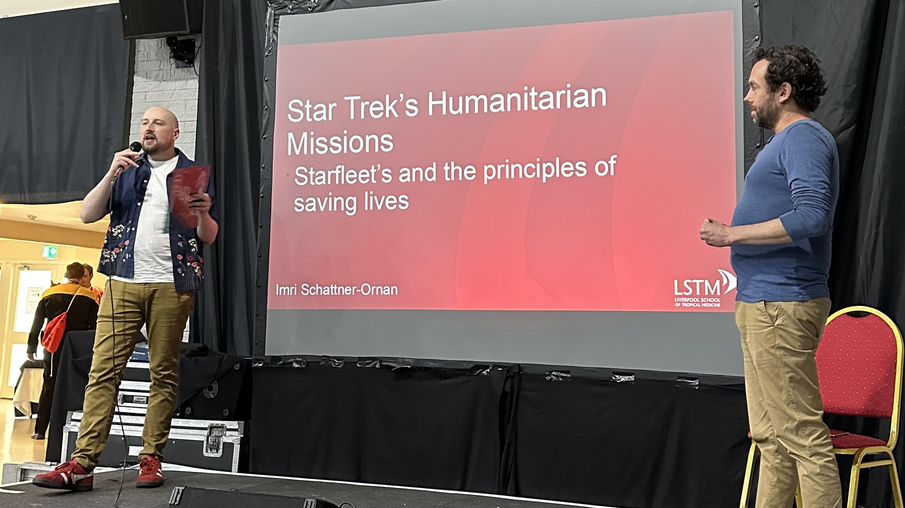 Photo of Imri (right) being introduced at the convention
