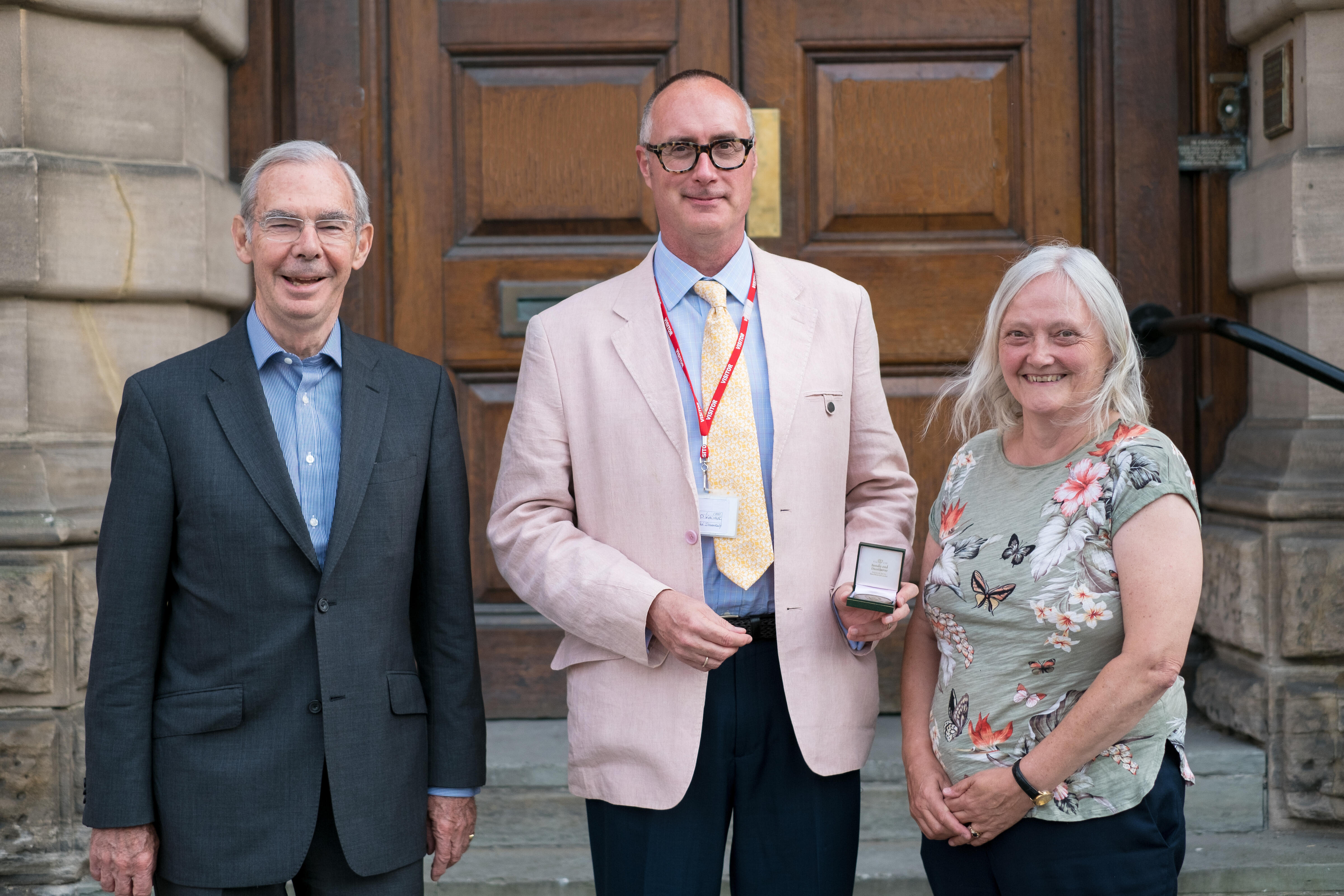 Dr S. Patrick Kachur (centre), Prof Hemingway (right) Mr James Ross (left)