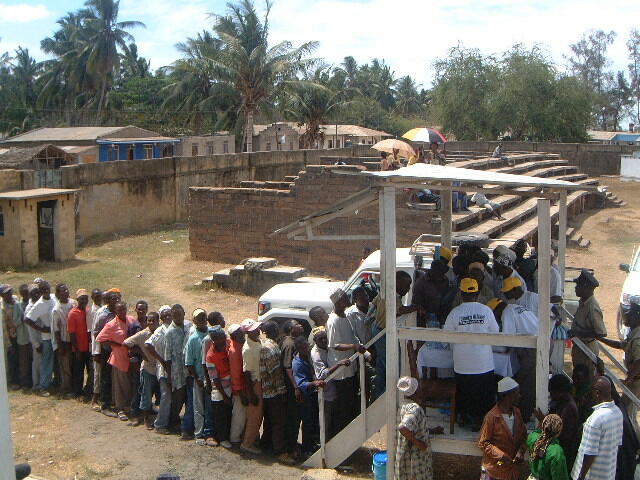 Queuing in the sun