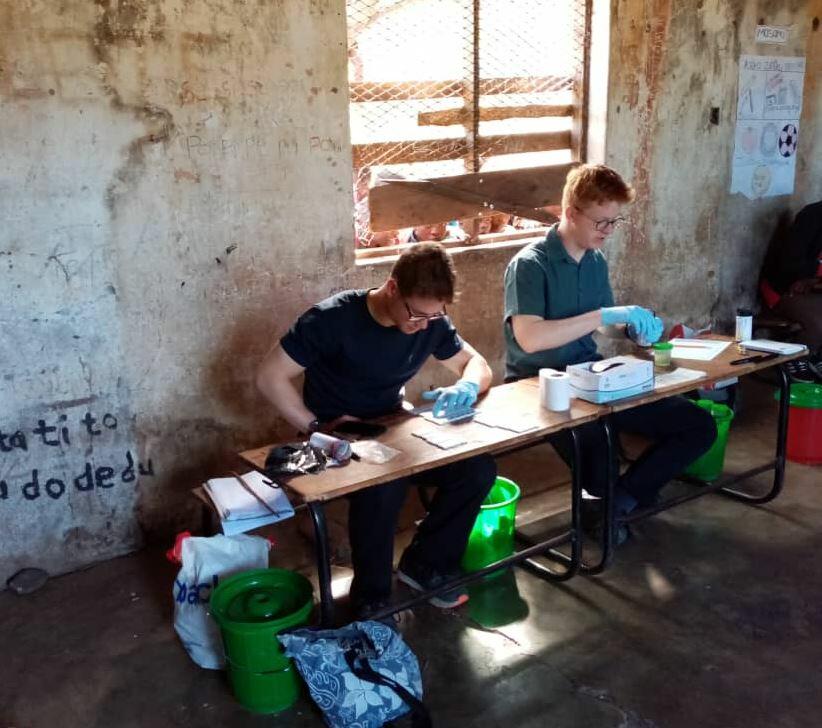 LSTM students, Angus More O'Ferrall and Hamish Baxter, doing their research in Malawi