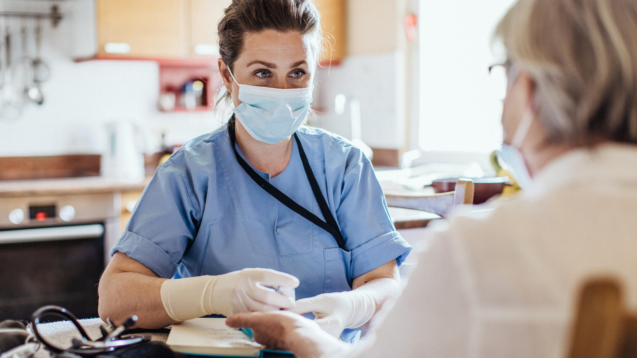 Healthcare worker at home visit