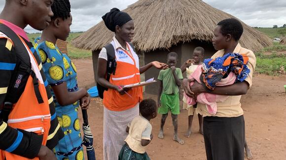 Conducting a Household Survey. Credit: Nancy Vollmer.