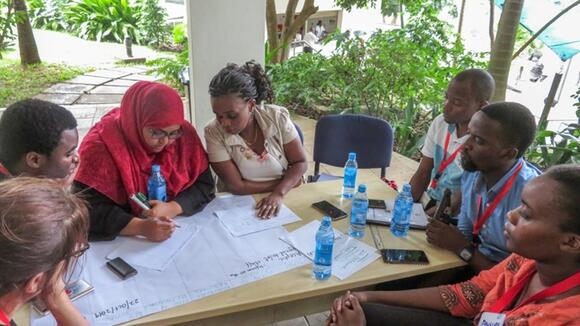Participants working on facility action plans in Kilifi, Kenya