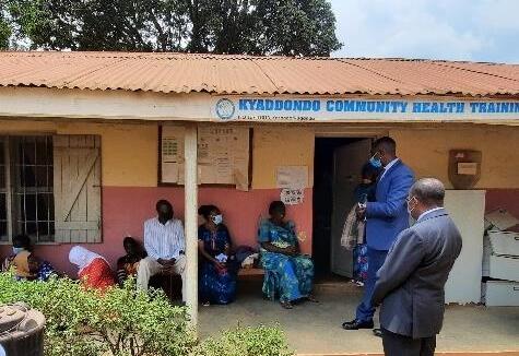 MoH officials interacting with patients in the waiting area