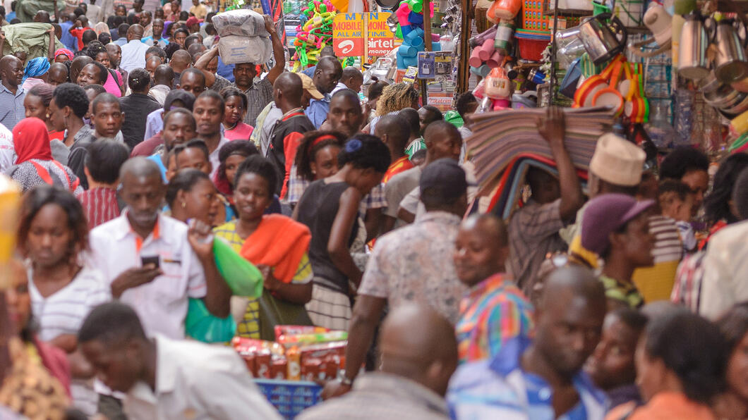 KAMPALA, UGANDA - APRIL 17TH 2018. People go about their everyday business in Kikuubo, one of Kampala's busiest trading areas.