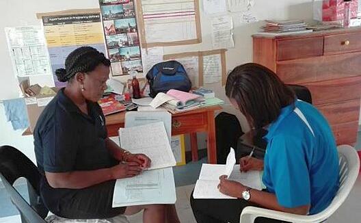 Collecting data at Onyaanya Health Centre