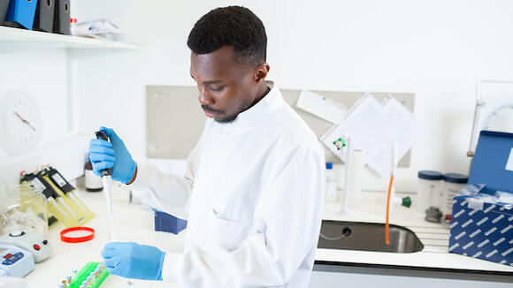 Photo of a student in the lab
