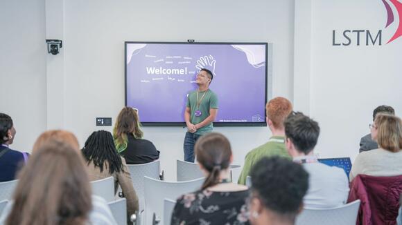Photo of a student ambassador as an LSTM open event