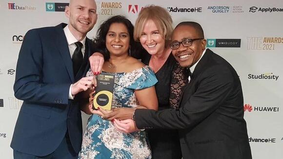 RESPOND Africa team members James Prior, Anu Garrib, Hazel Snell and Joseph Okebe receiving the award