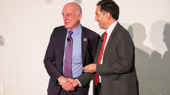 Dr David Nabarro (left) receives the Leverhulme medal from LSTM Director David Lalloo