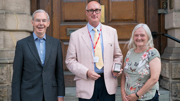 Dr S. Patrick Kachur (centre), Prof Hemingway (right) Mr James Ross (left)