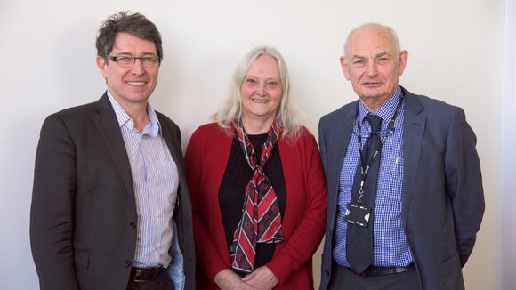 Dr Dirk Engels (left) with LSTM Director Professor Janet Hemingway and Emeritus Professor David Molyneux (right)