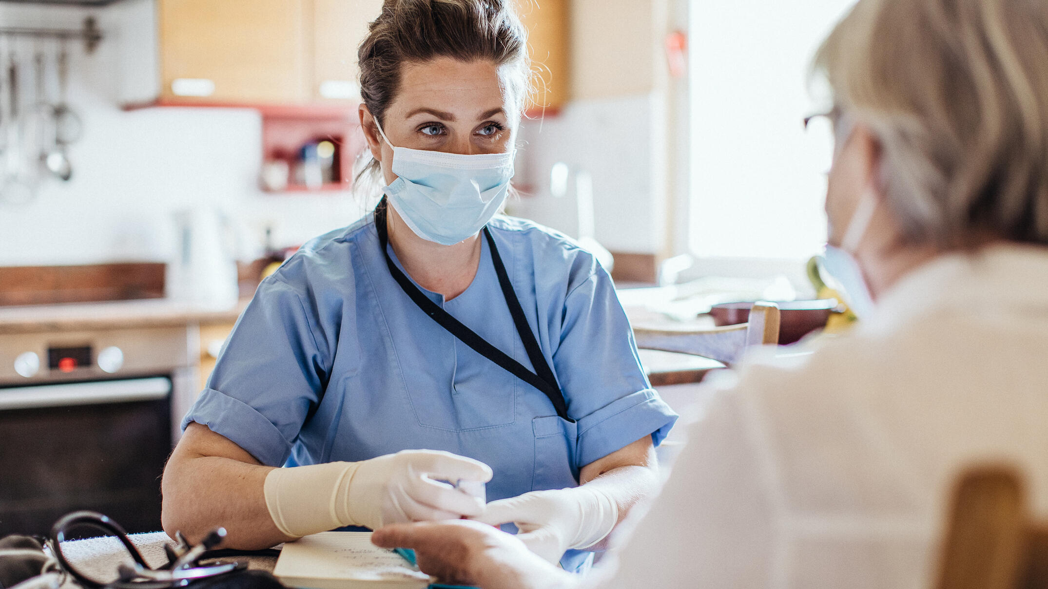 Healthcare worker at home visit